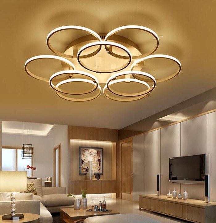 Ai đang theo đuổi phong cách hiện đại cho phòng khách thì chọn ngay mẫu đèn chùm ốp trần dạng tròn này nhé
